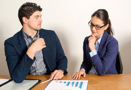 two young business people discussing